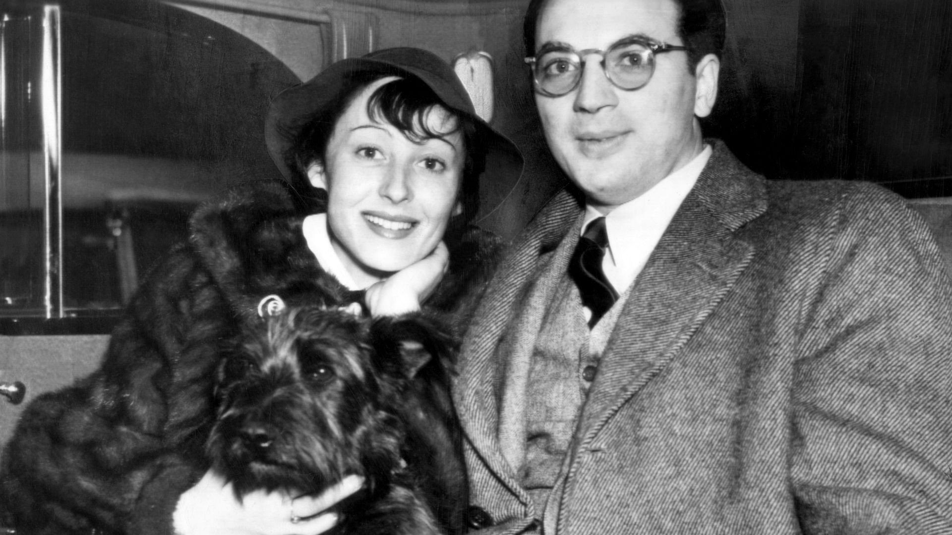Photograph of Luise Rainer and Clifford Odets

Caption reads as follows: LOS ANGELES, JAN. 4. -- FILM ACTRESS TO WED SCREEN WRITER -- Luise Rainer, Viennese screen actress, and Clifford Odets, film writer, are shown here today just after they had filed no