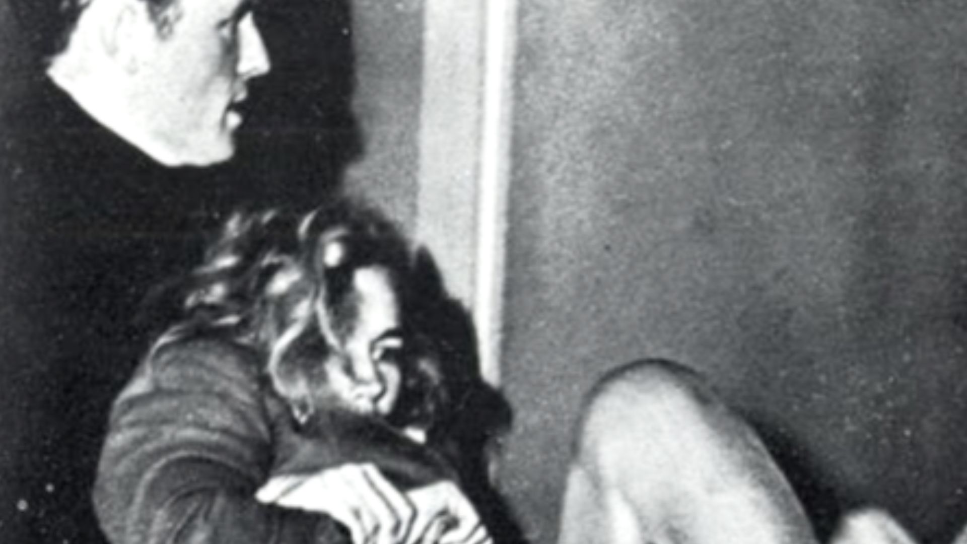 Photo of Frances Farmer being restrained during court hearing, dated 1943 (repub. 1957)
