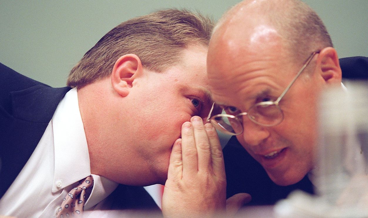 WASHINGTON, : Richard Jewell (L) confers with his attorney Watson Bryant 30 July while testifying before the US House Committee On The Judiciary in Washington, DC. At one time, Jewell was considered by the FBI to be the leading suspect in the 27 July 1996 bombing in Olympic Park in Atlanta. Jewell was later ruled out as a suspect. 