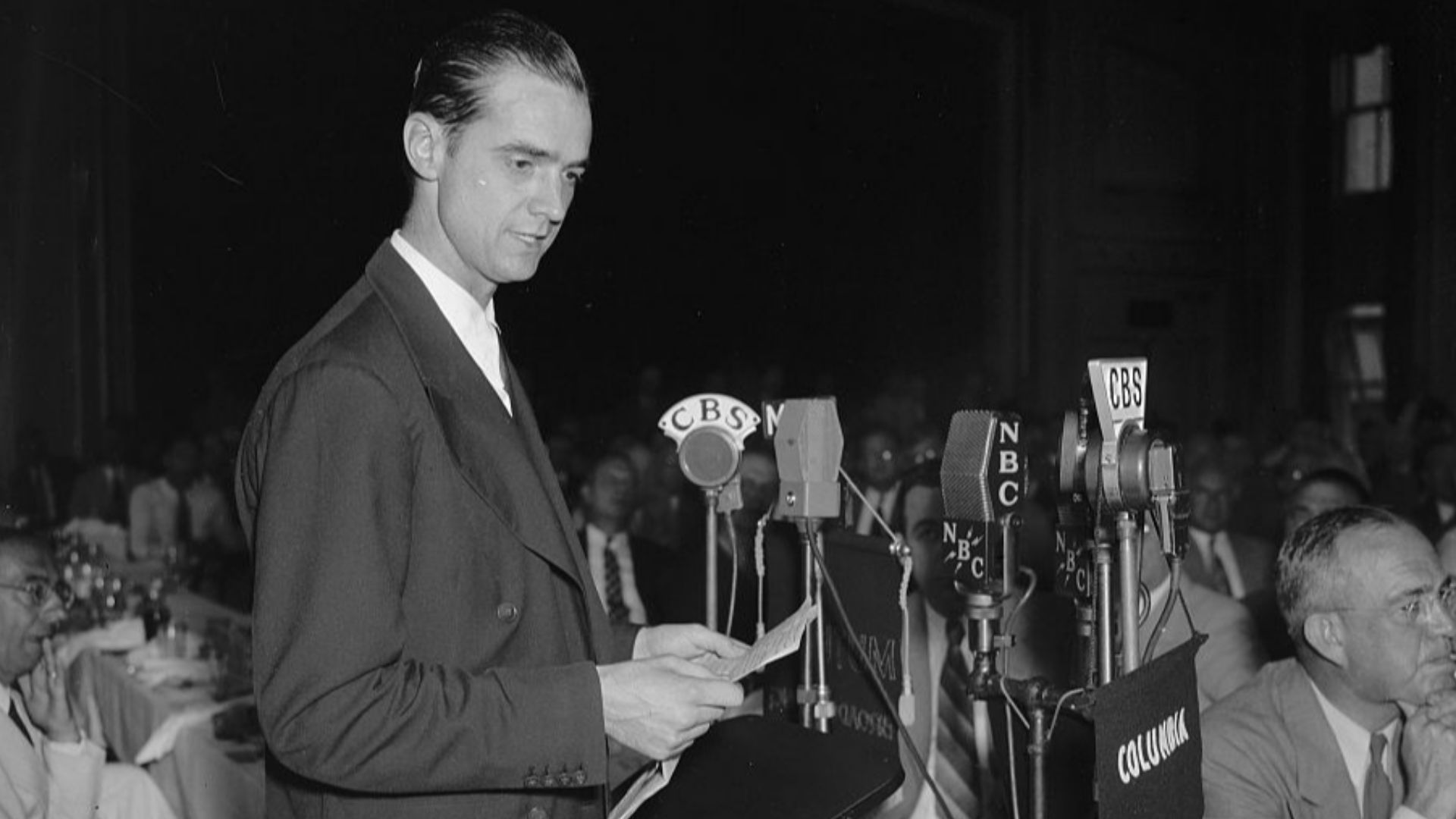 Title: Howard Hughes speaking before the Press Club. Washington, D.C., July 21. Howard Hughes, speaking at the National Press Club today, before hundreds of government officials and representatives of foreign governments. Hughes today envisioned a future 