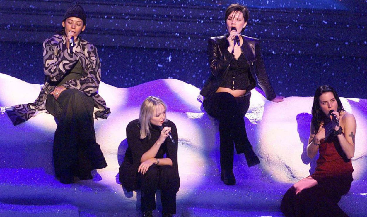LONDON - 1998: L to R Singers Mel B, Emma Bunton, Victoria Adams and Mel C rehearse for the Royal Variety performance at the Dominion Theatre, London. Victoria shows off her bump, pregnant with Brooklyn and Mel B hides hers. 