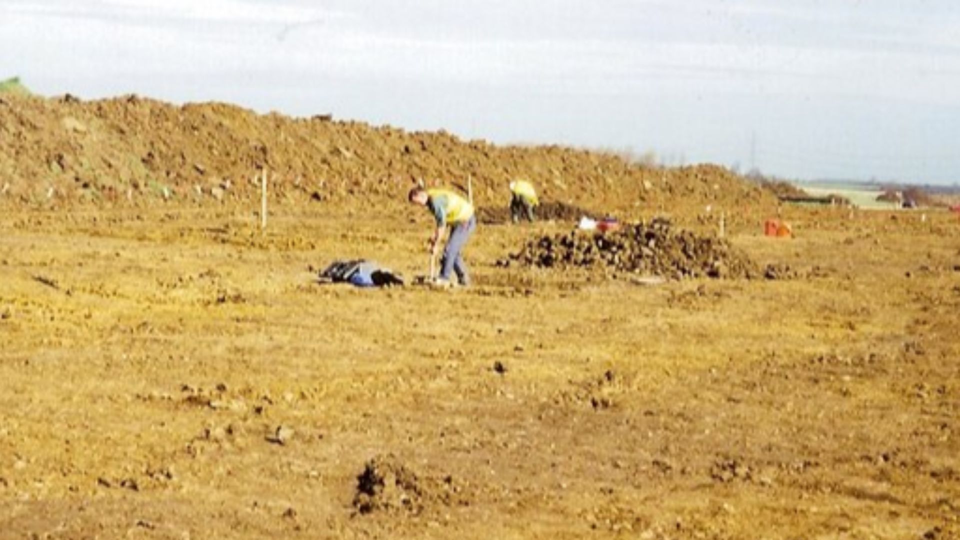 Archeologists At Work. On any large scale building or construction project archeological surveys are undertaken. On this pipeline project 1036695 several sites were examined. This one in particular went into Time Team mode. Dark circular rings showed up i
