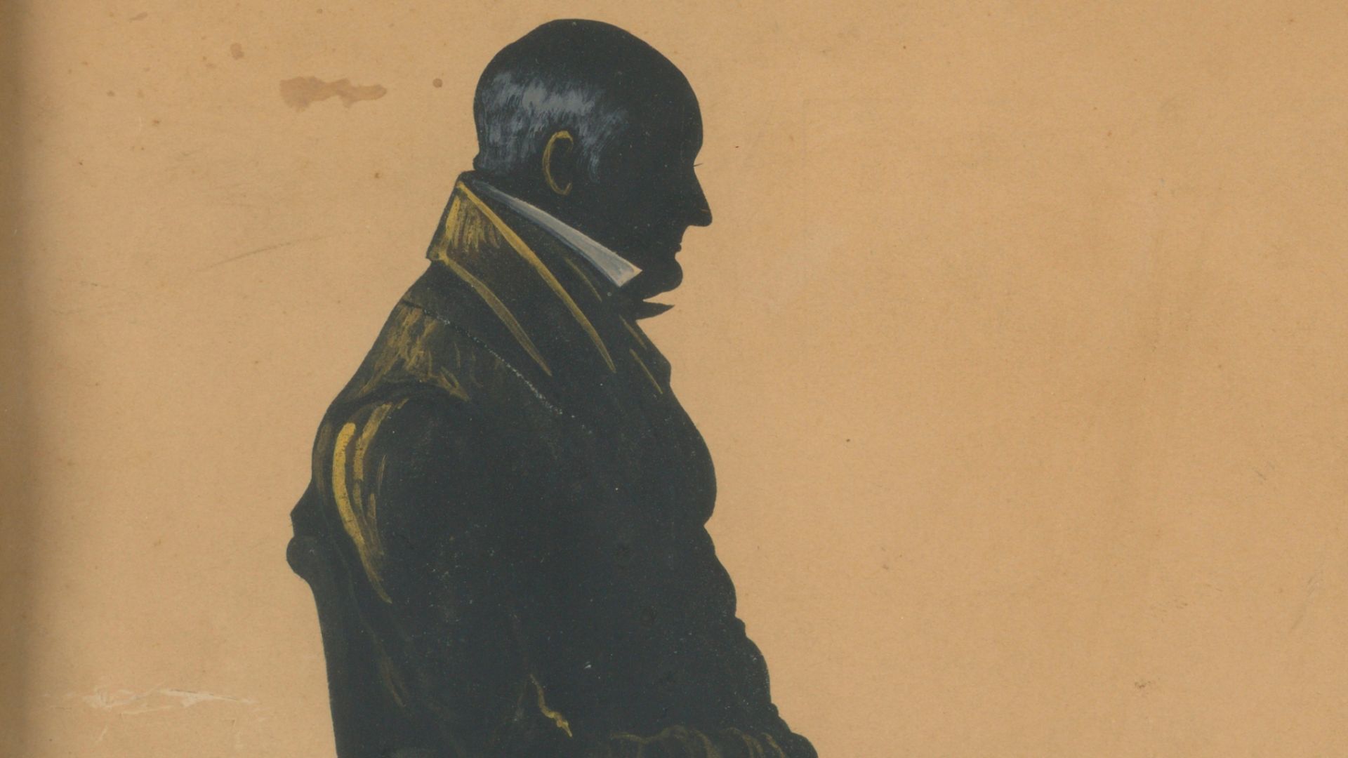 Full length silhouette of a man in chair, facing right. Wood frame.