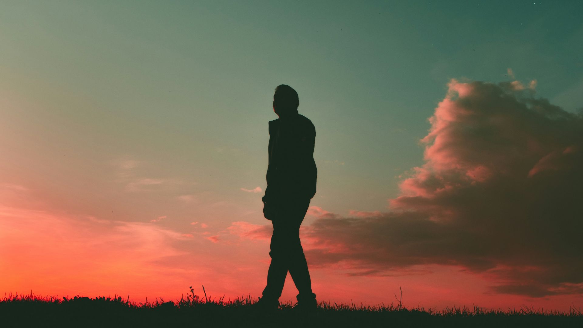 silhouette of man during sunset