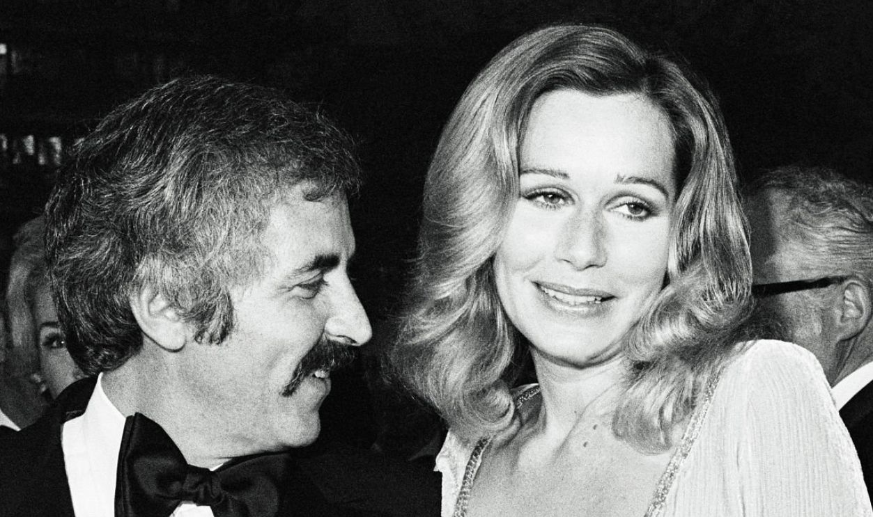 (Original Caption) Revealing. Hollywood: One of the most revealing outfits worn by Hollywood celebrities at the 43rd annual Academy Awards was that of actress Sally Kellerman, who arrived with her husband Rick Edelstein, wearing a see-through braless outfit.