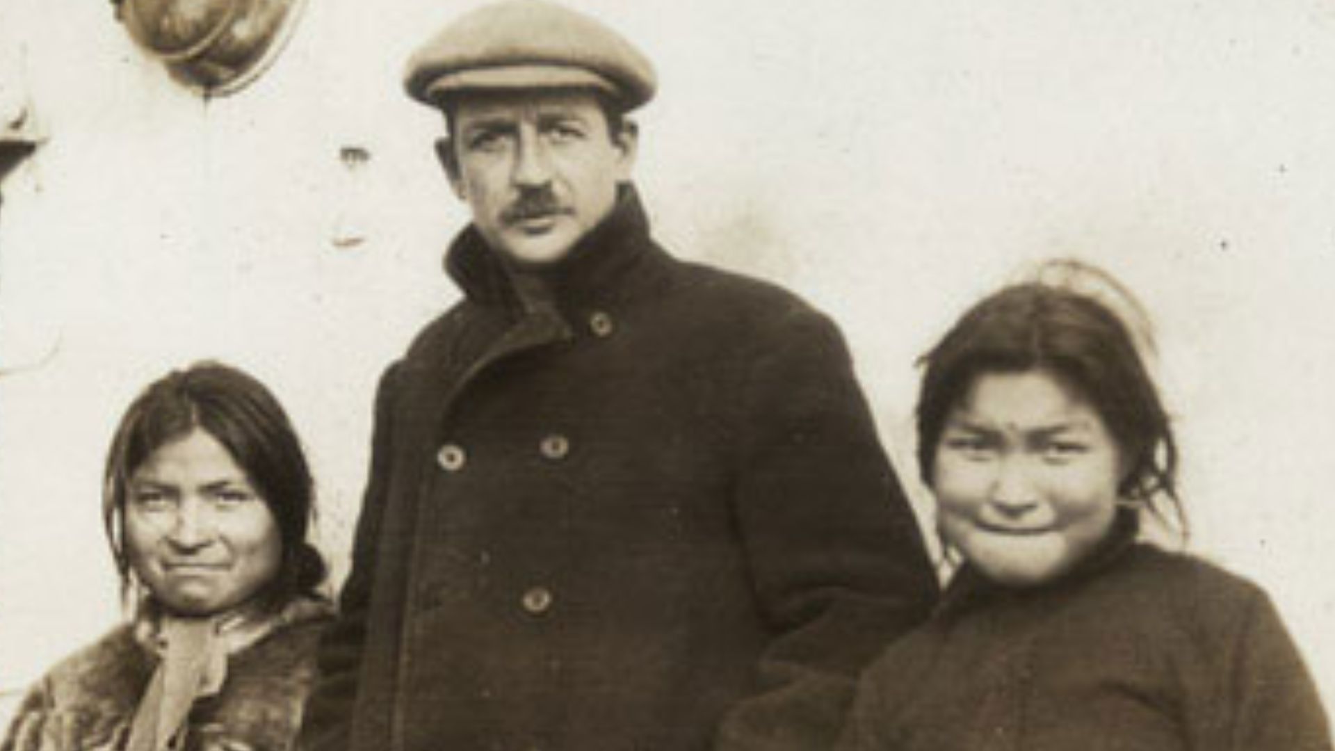 American sportsman, adventurer and writer Harry Whitney with two Inuit women.