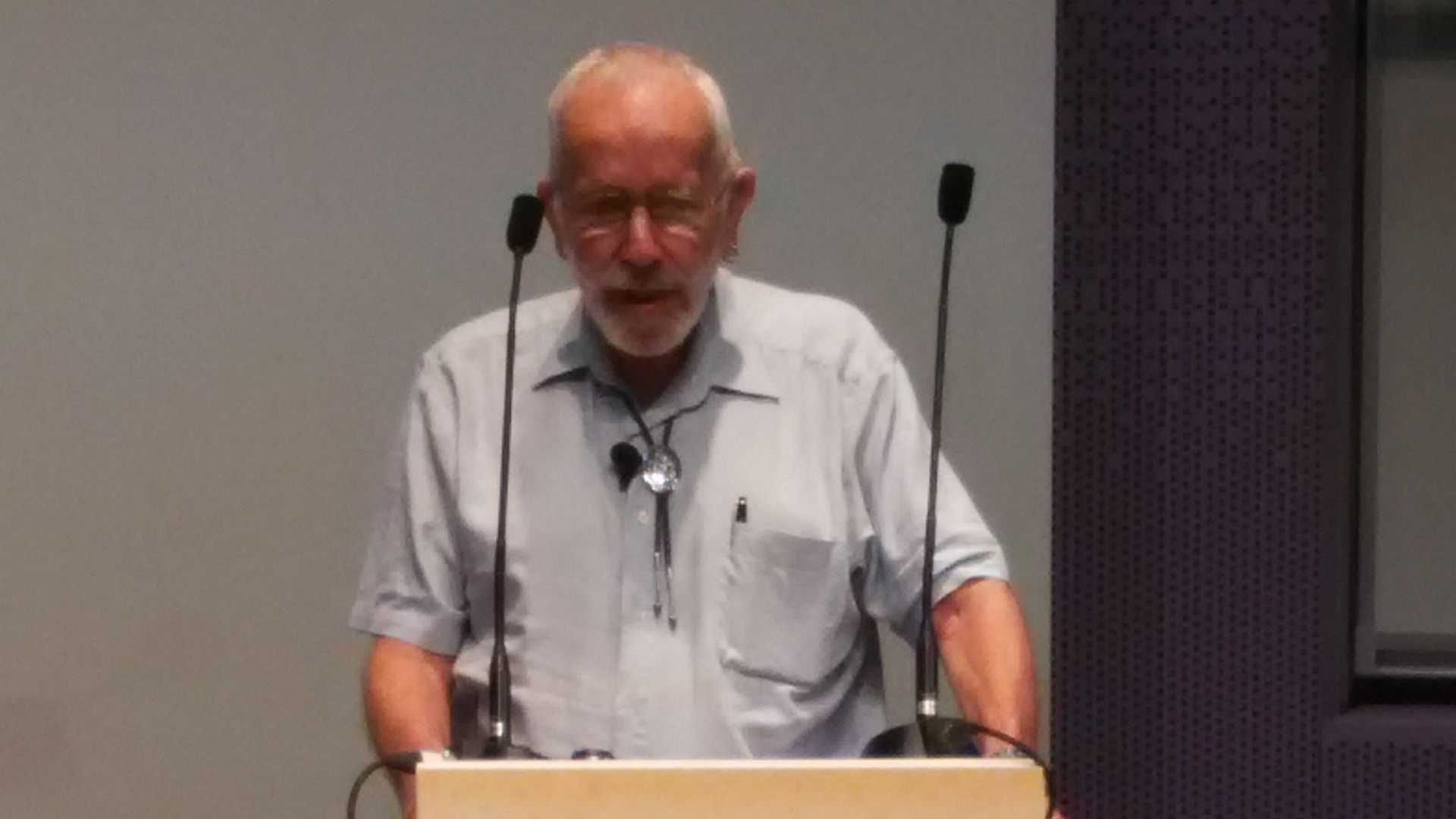 Prof. John Robin Warren giving a talk
