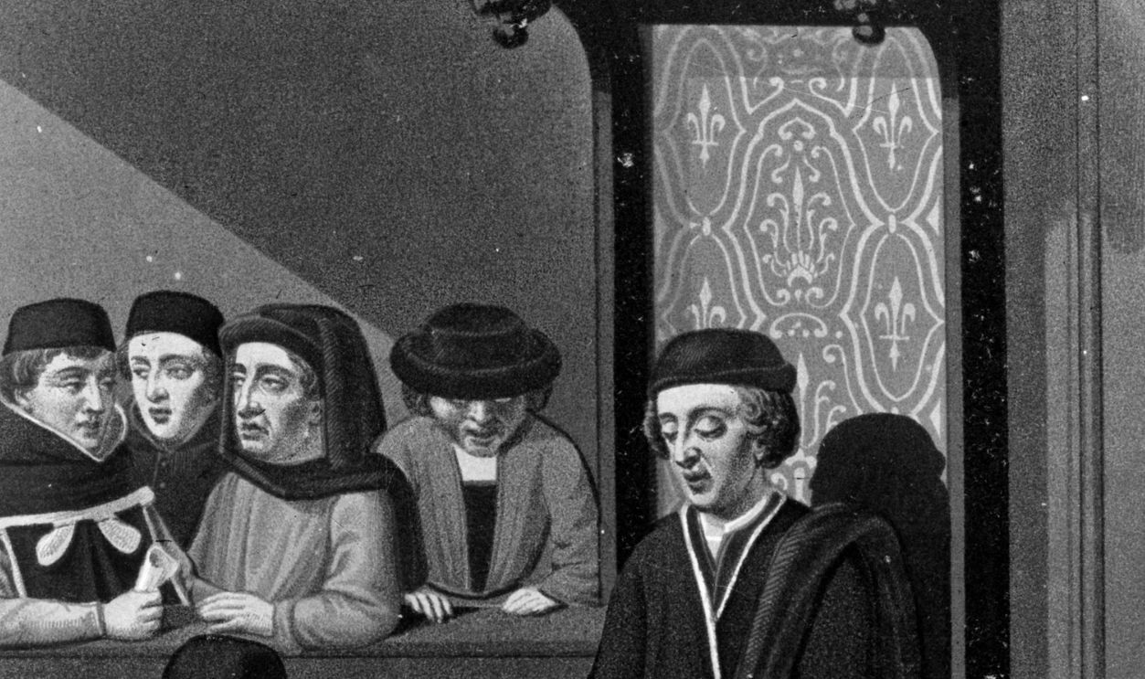Circa 1450, A medieval court of law with a judge dictating to a notary, while prisoners are kept under control with ropes around their necks. 