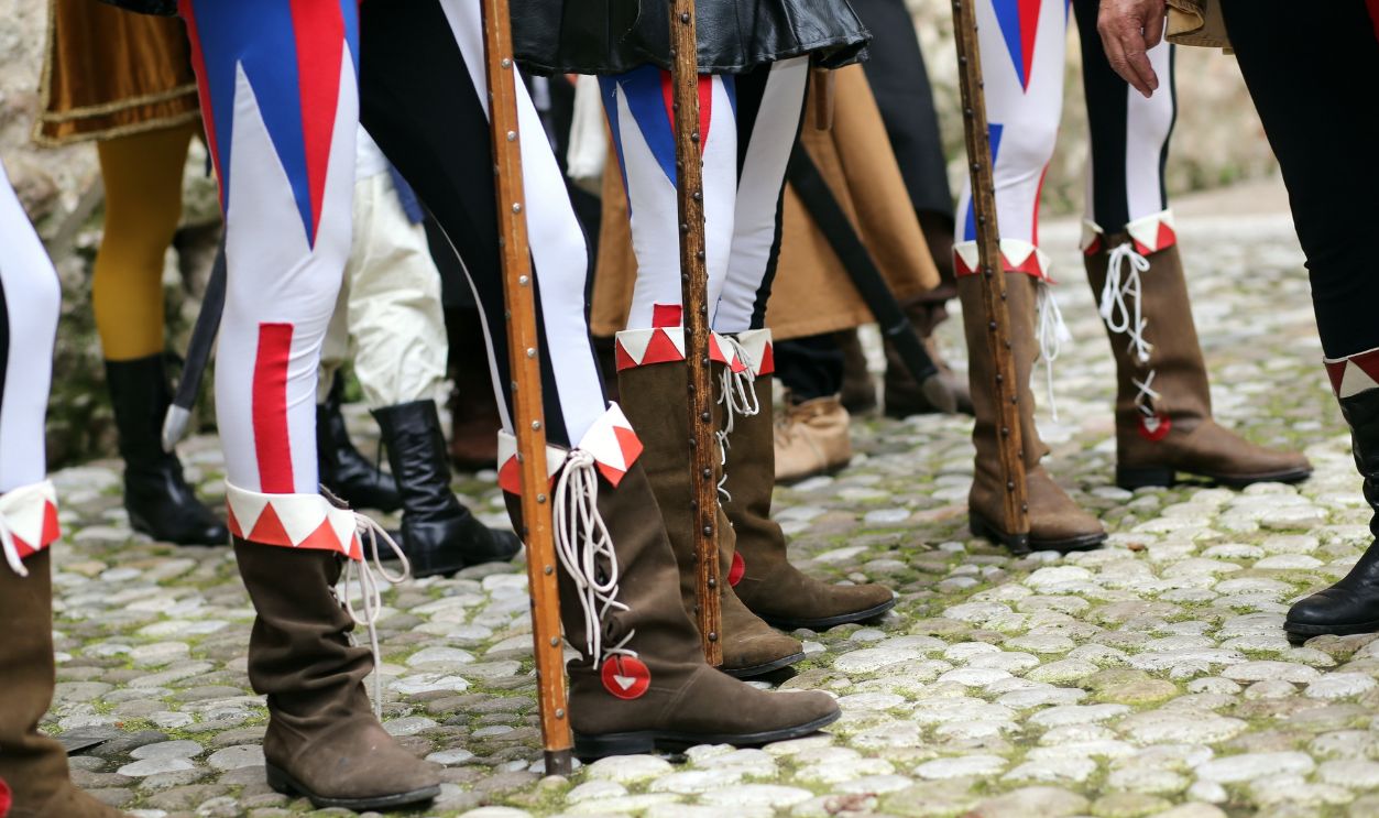 medieval reenactment with costumed characters and ancient clothes