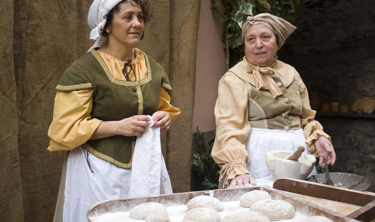 TAGGIA-IMPERIA, ITALY FEBRUARY 27: Unidentified females participating of medieval costume party in the historic city of Taggia, Italy on February 27, 2011.