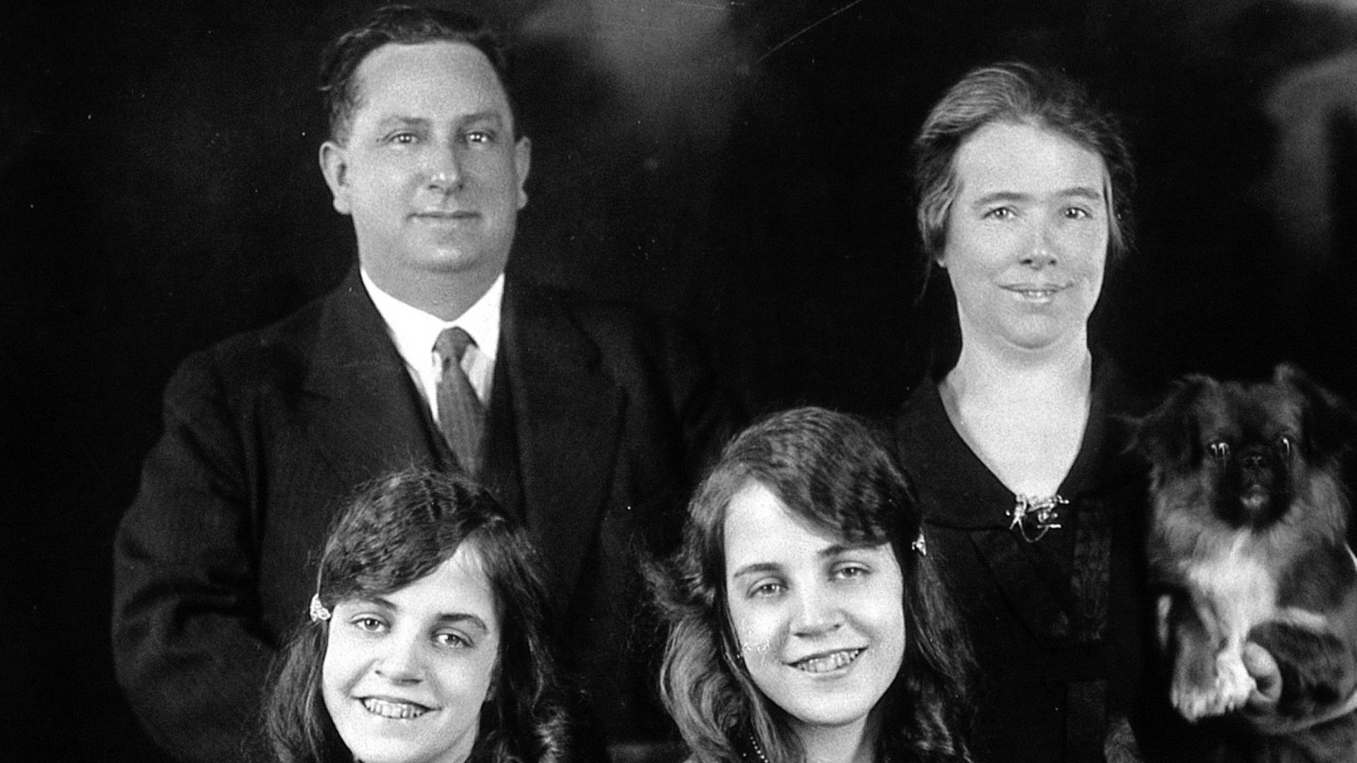 Daisy and Violet Hilton, conjoined twins, with the Meyers, with whom they lived and who managed them