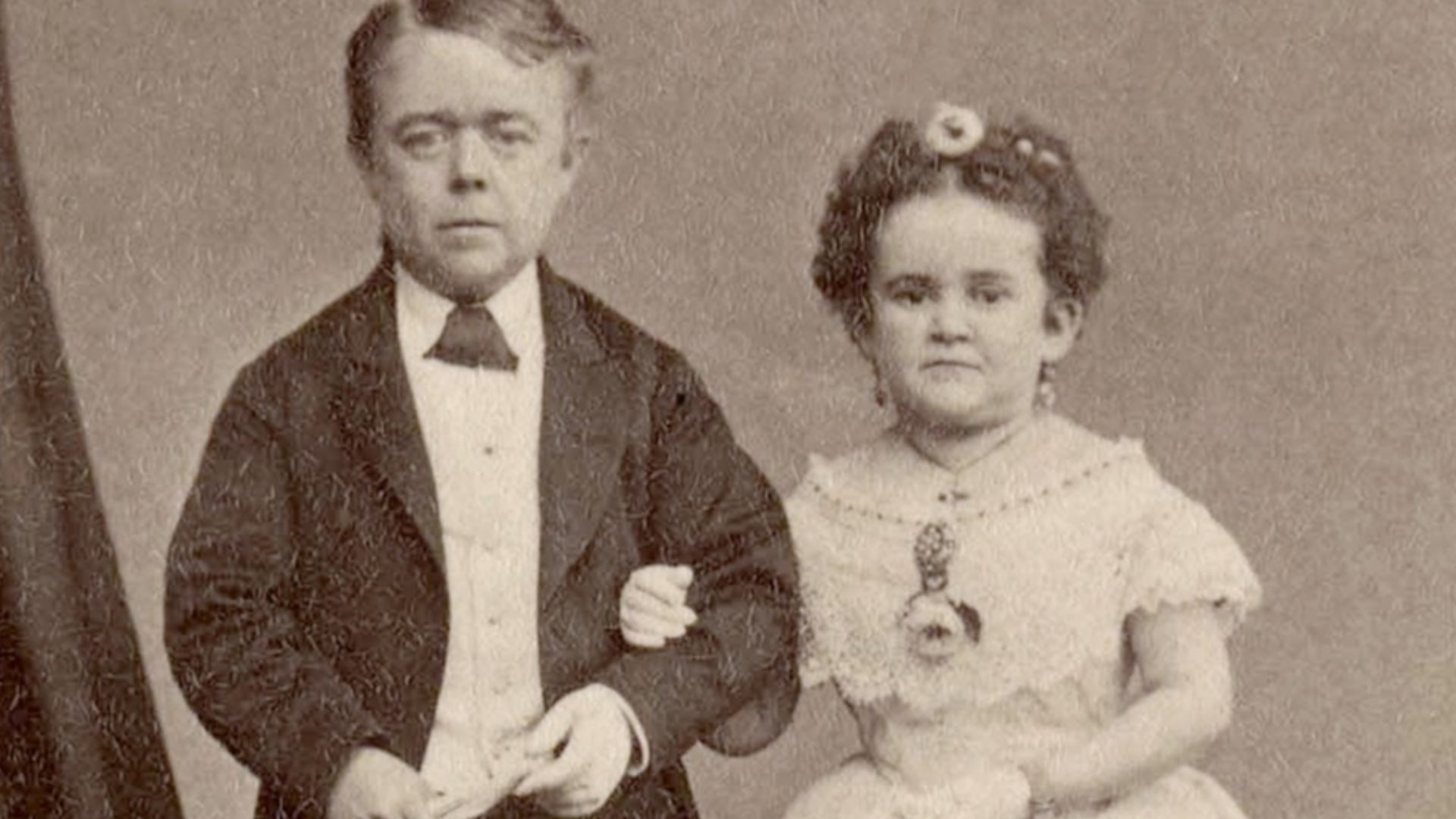 George Washington Morrison Nutt and Minnie Warren, midgets who were often paired in P. T. Barnum's shows, are posed here in wedding attire.
