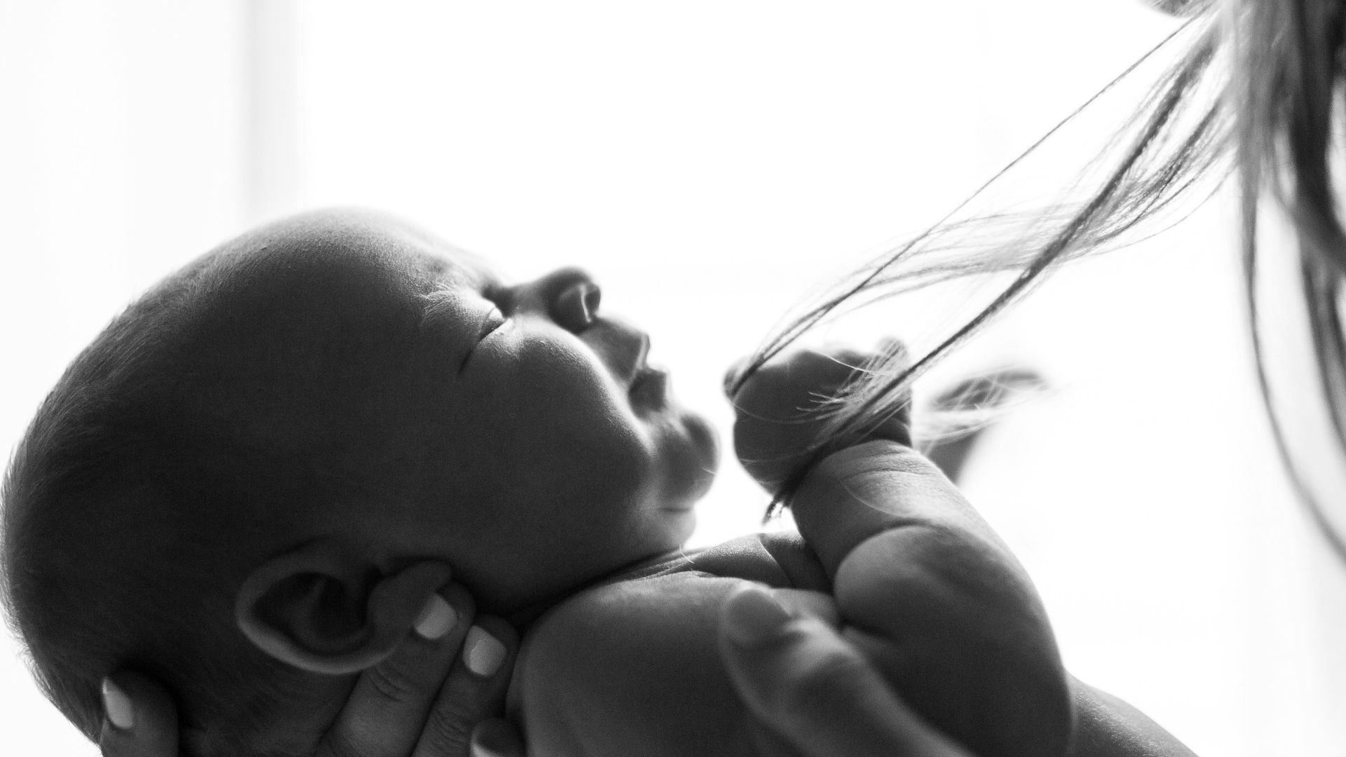woman holding baby