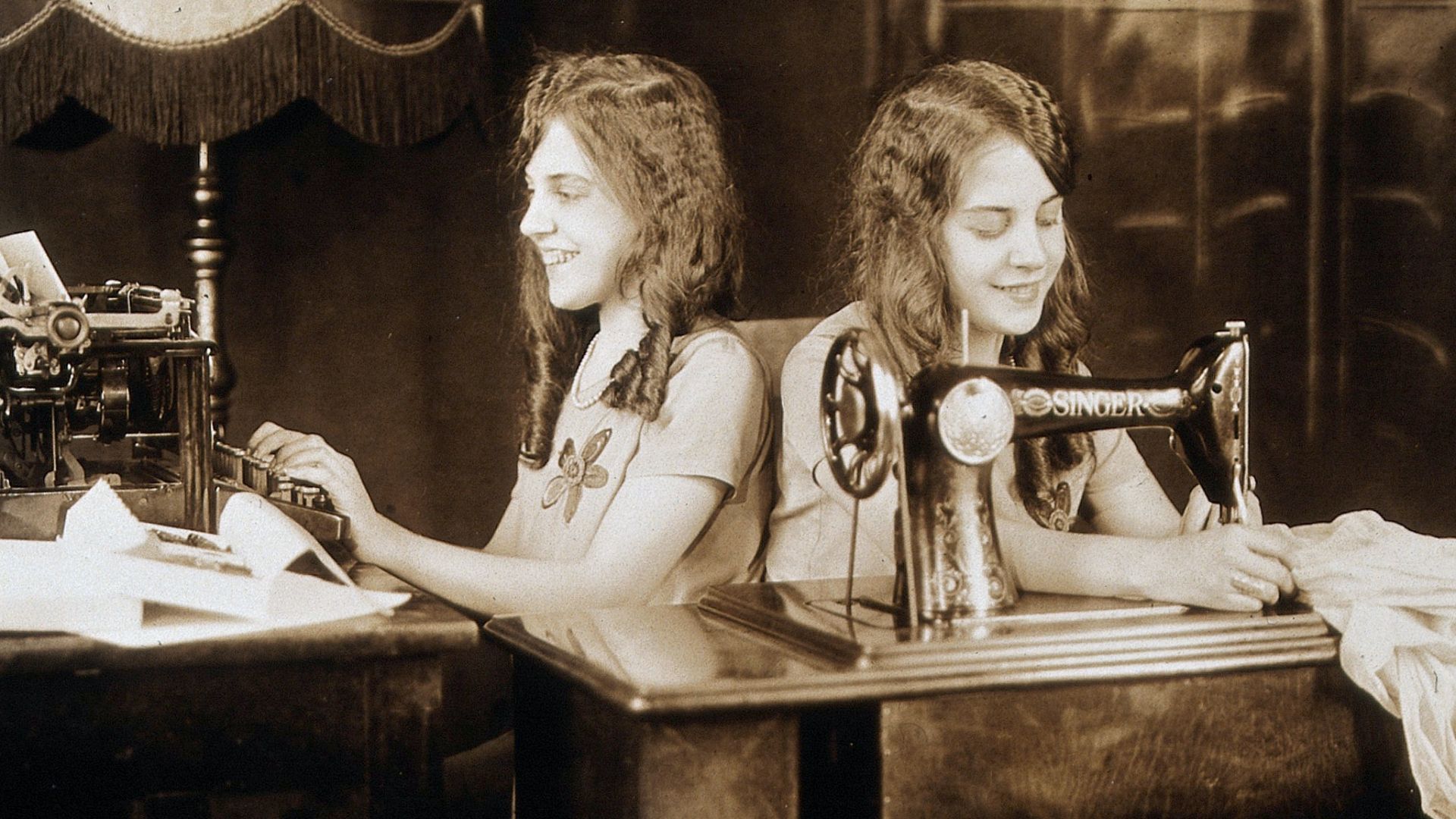 Daisy and Violet Hilton, conjoined twins, one sewing, one using a typewriter. Photograph, c. 1927.

Iconographic Collections
