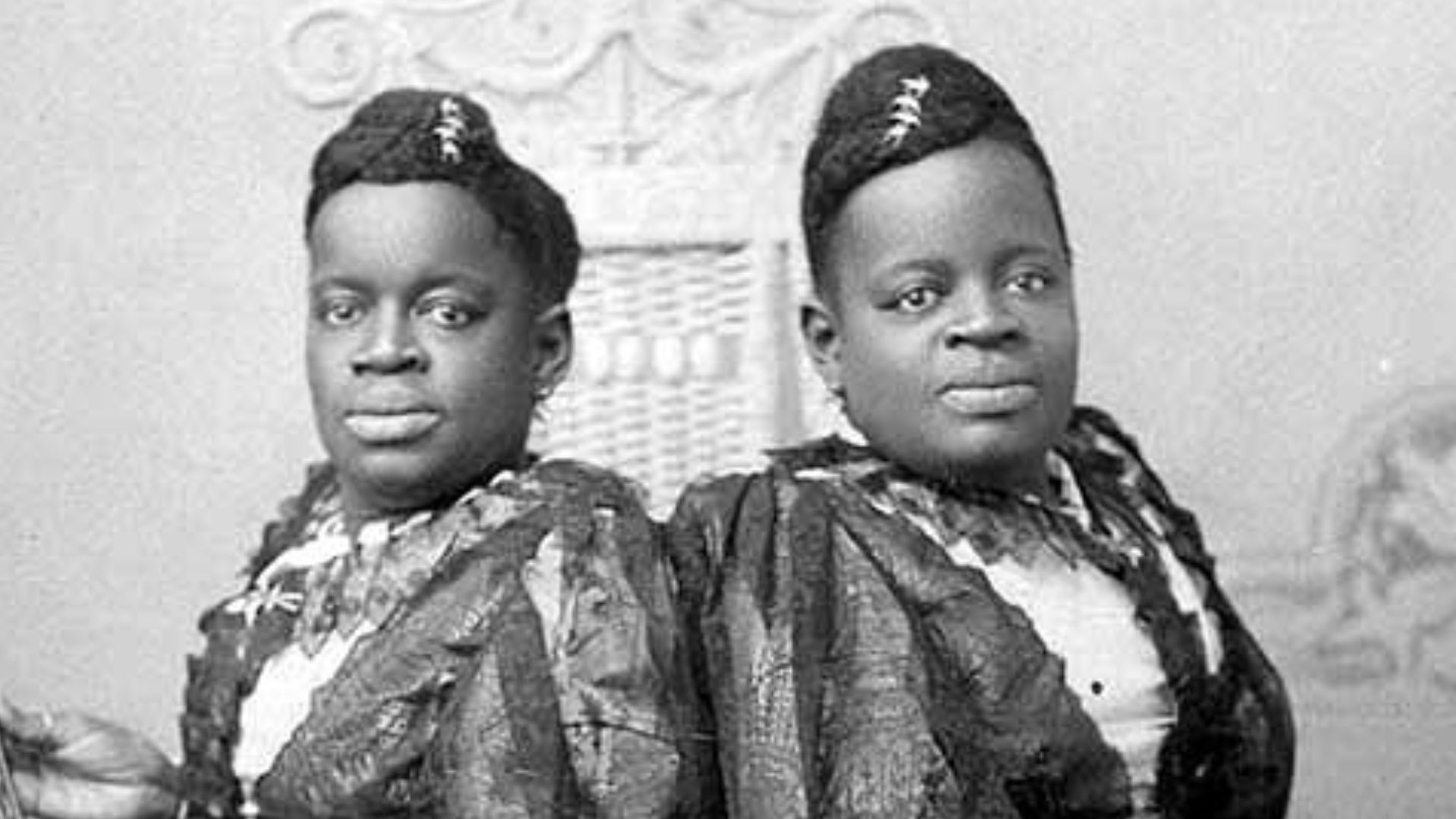 Original, early to mid-1890s era cabinet photo of conjoined twins Millie and Christine McCoy. Most likely while they were on tour in California, this image was taken by photographer Michael A. Wesner of Los Angeles.