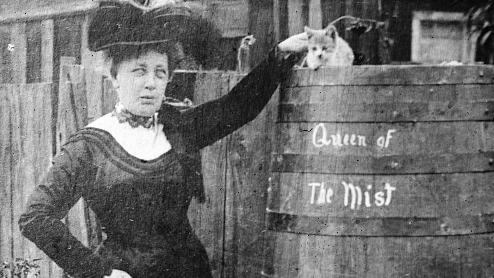 Annie Edson Taylor, first person to go over Niagara Falls in a barrel and survive; cat in photo is likely the same cat that went over the falls in a test run. Published in: Over the Falls: Annie Edson Taylor's story of her trip: how the Horseshoe Fall was