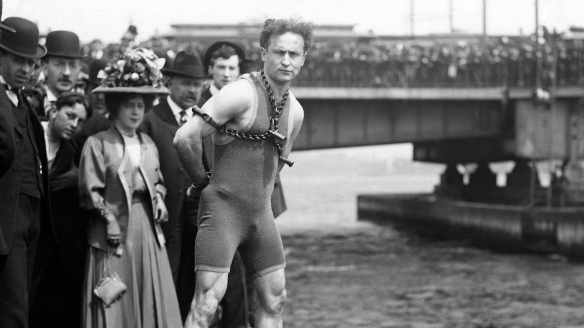 Title: Houdini jumps from Harvard Bridge, Boston, Massachusetts] / John H. Thurston, stereopticons
Abstract/medium: 1 photograph : glass lantern slide ; 82 x 102 mm.