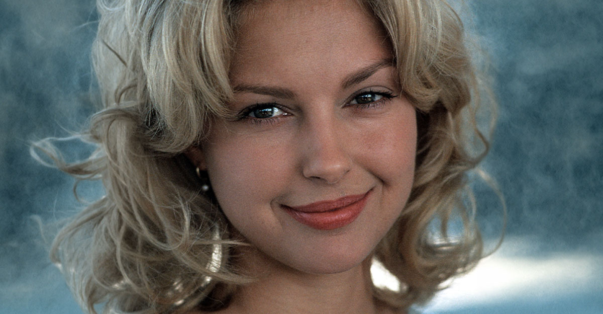 Ashley Judd with blonde, curly hair