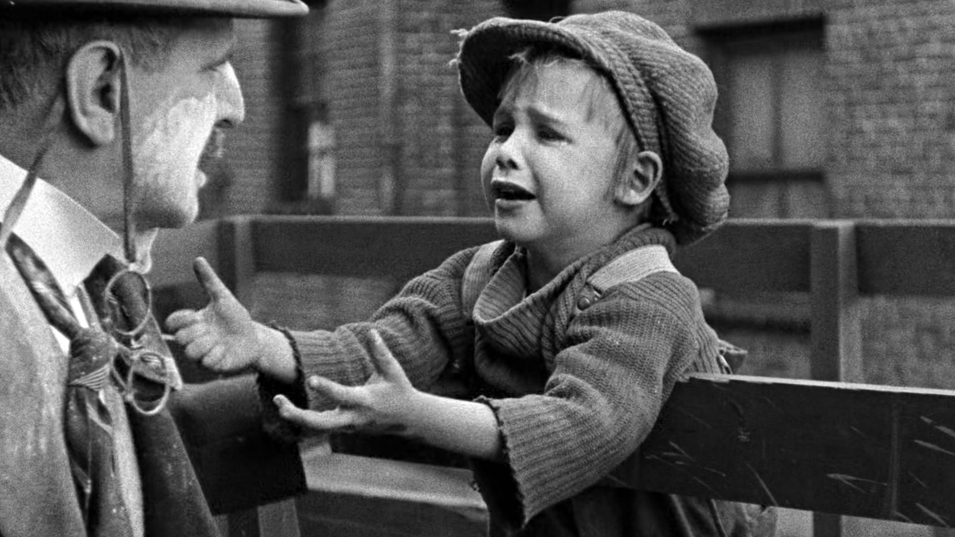 Frank Campeau (the man) and Jackie Coogan (child) in The Kid (1921).