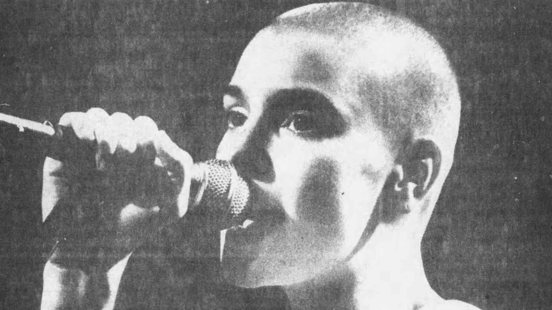 Newspaper clipping of Sinéad O'Connor performing at the Paradise theater on March 31, 1988. Taken from the The Boston Globe, April 2, 1988.