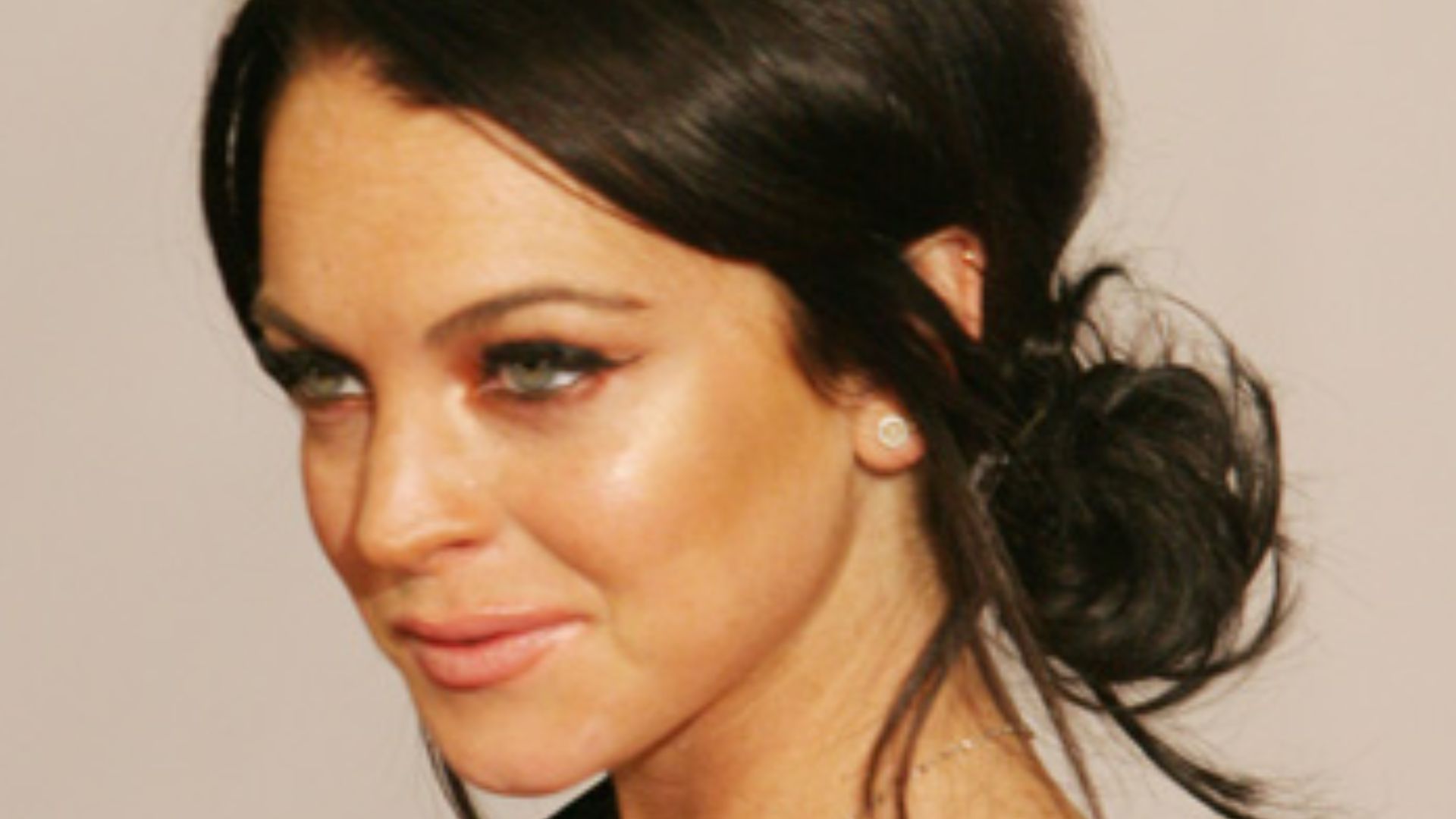 Actress Lindsay Lohan, arriving to the General Motors Annual ten Celebrity Fashion Show. Photo by Rafael Amado Deras.