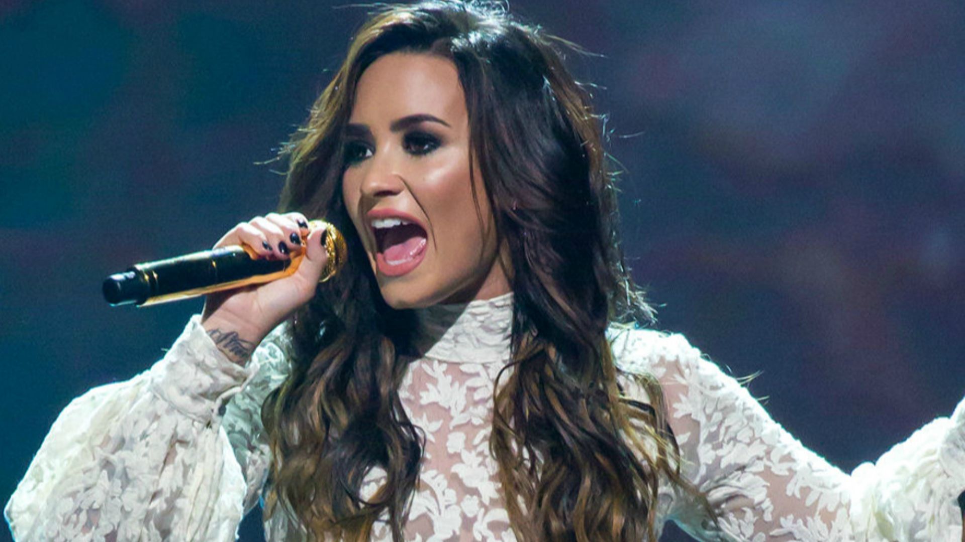 Demi Lovato performing at the AT&T Center in San Antonio, Texas on September 10, 2016.