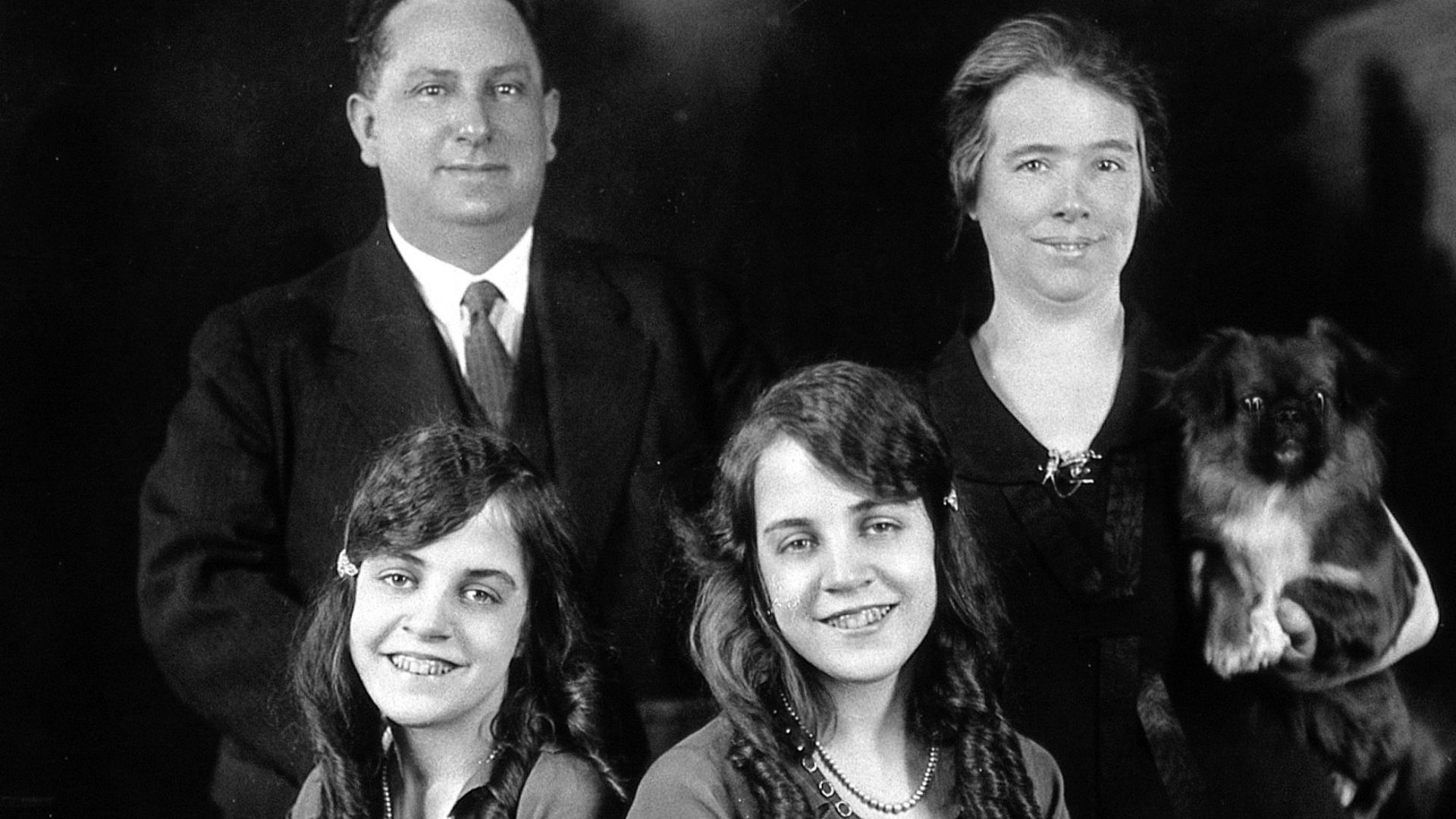 Daisy and Violet Hilton, conjoined twins, with the Meyers, with whom they lived and who managed them