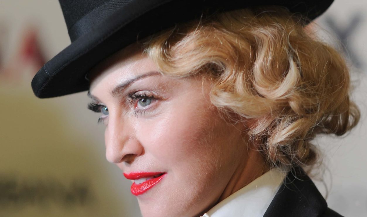 NEW YORK, NY - JUNE 18: Madonna attends the Dolce & Gabbana and The Cinema Society screening of the Epix World premiere of "Madonna: The MDNA Tour" at The Paris Theatre on June 18, 2013 in New York City. 