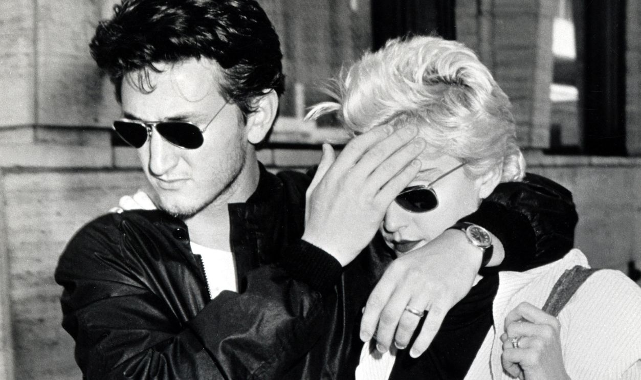 Actor Sean Penn and singer Madonna leave the Mitzi E Newhouse at Lincoln Center, New York, New York, August 13, 1986. They were on a break during rehearsals for the Lincoln Center Workshop's production of 'Goose and Tomtom.'