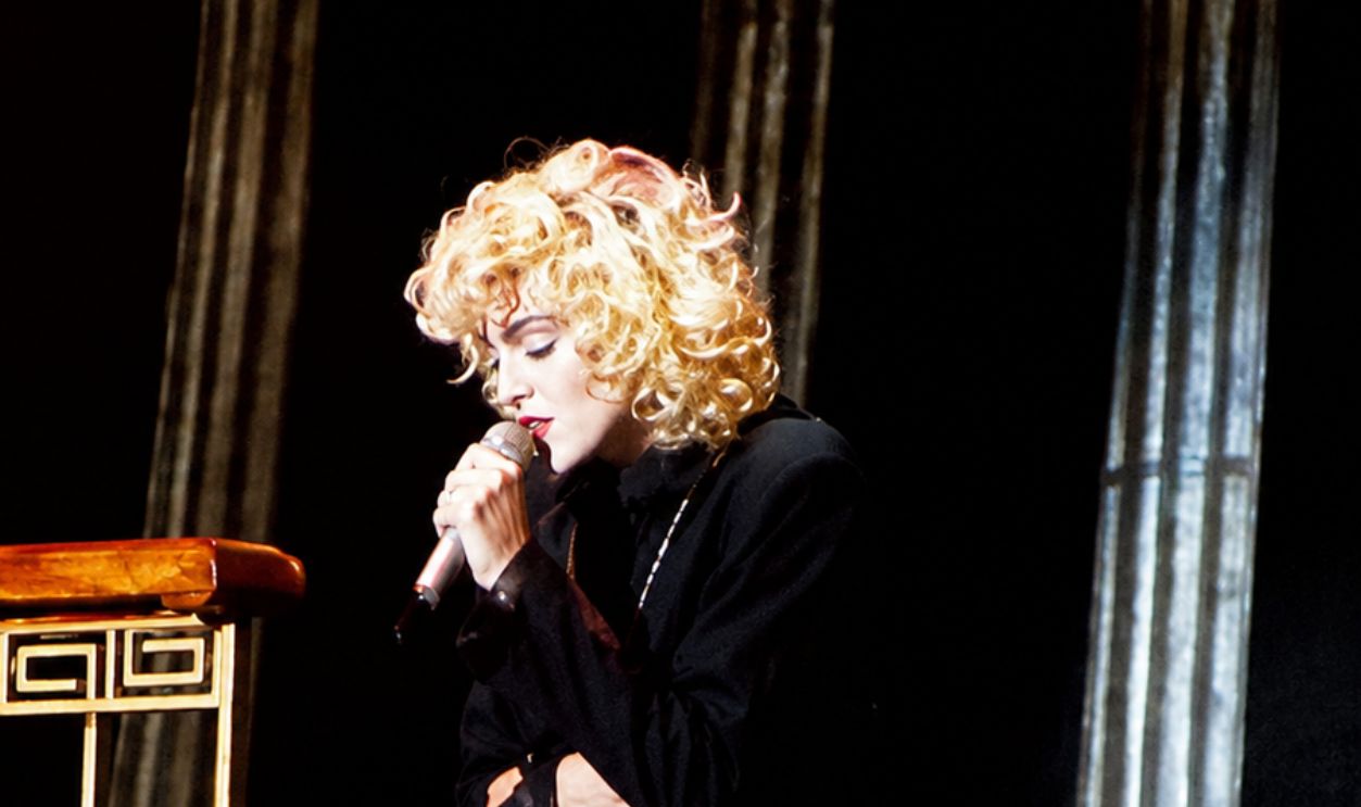 Madonna performing a medley of "Live to Tell" and "Oh Father" during the Blond Ambition World Tour in 1990 