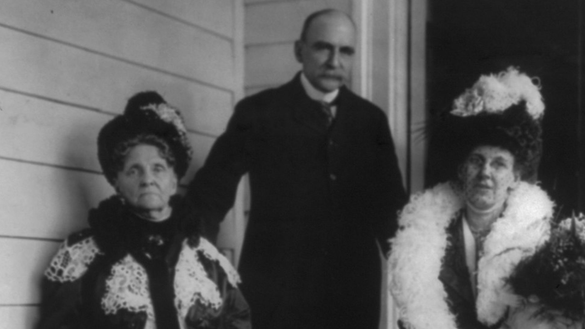 Title: Matthew Astor standing on porch behind his wife and Hetty Green
Abstract/medium: 1 photographic print.