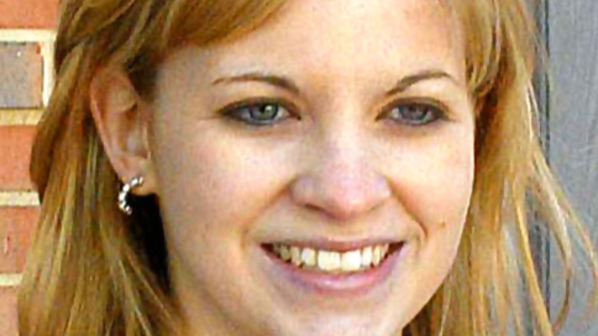 Jessica Lynch, pose at the doorway for the new Fisher House at Walter Reed Army Medical Center in Washington April 28, 2004.