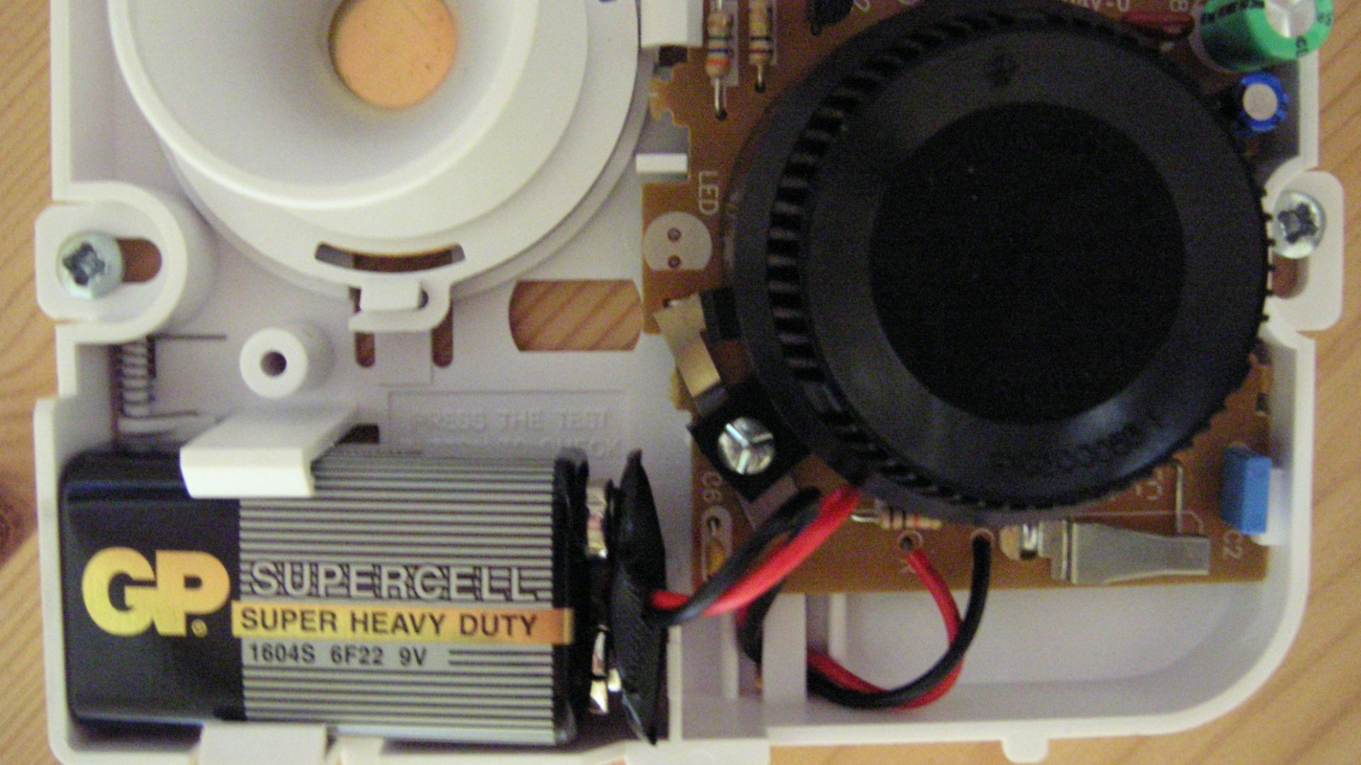 A basic ionization smoke alarm by Ei Electronics.