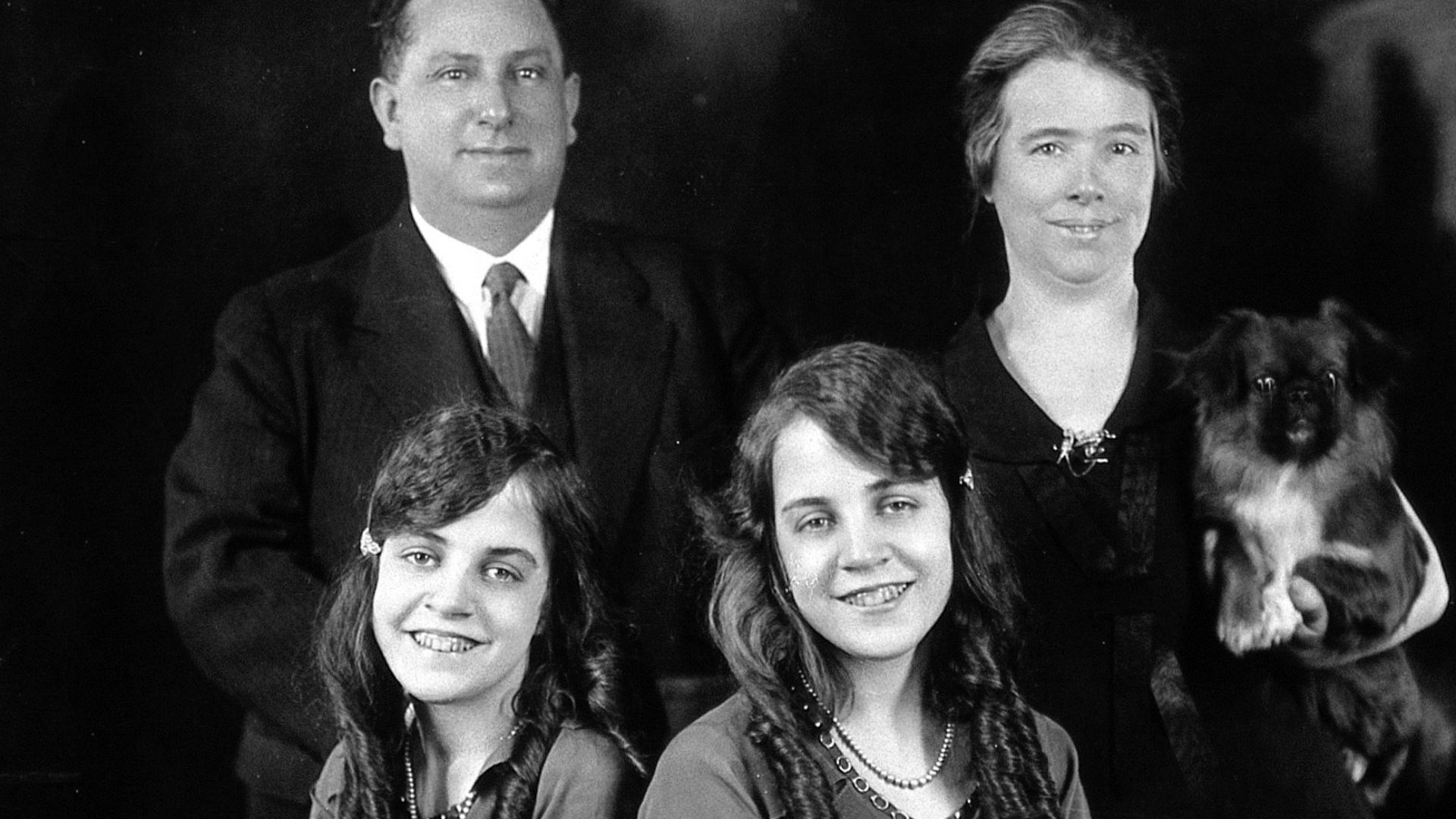 Daisy and Violet Hilton, conjoined twins, with the Meyers, with whom they lived and who managed them