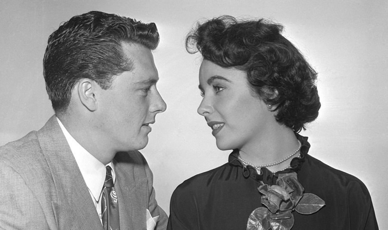 (Original Caption) 2/22/1950-Hollywood, CA- Elizabeth Taylor, teenage screen star, and Conrad Nichols Hilton Jr., 23, will be married May 6th in a church ceremony in Hollywood. The engagement of the star to the young Hilton Hotel chain heir was formally announced Feburary 21st. The couple met a year ago and have been dating steadily since the Christmas holidays.