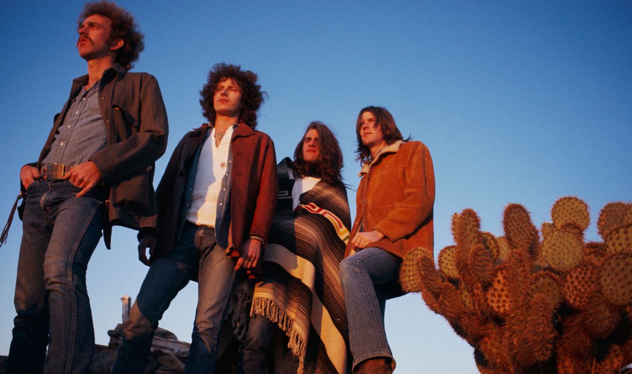 March 1972 --- The rock band The Eagles rest in a desert valley. The Eagles were the most popular band of the seventies and their reunion tour in the nineties was also very successful. L-R: Bernie Leadon, Don Henley, Glenn Frey, and Randy Meisner.