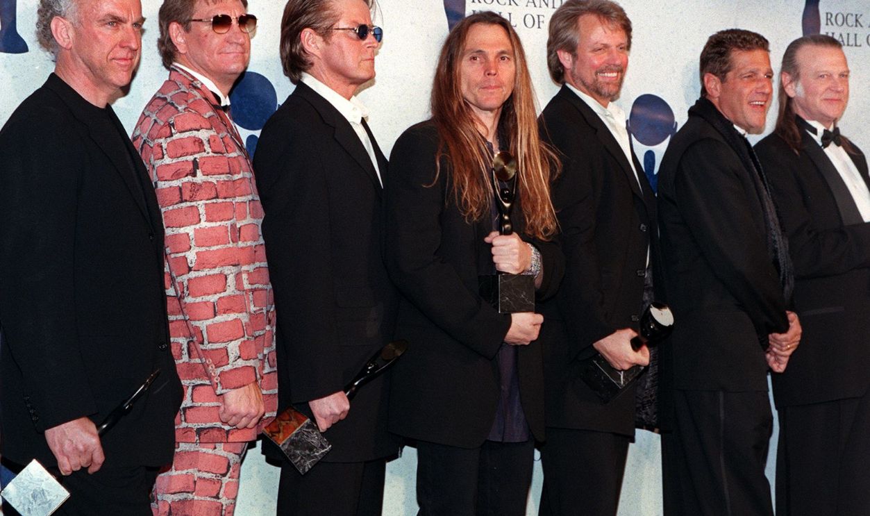 NEW YORK, UNITED STATES: The Eagles (from left:) Bernie Leadon, Joe Walsh, Don Henley, Timothy Schmit, Don Felder, and Randy Meisner appear together after receiving their awards and being inducted into the Rock & Roll Hall of Fame 12 January in New York. The thirteenth annual Rock and Roll Hall of Fame induction dinner honored Fleetwood Mac, Santana, The Mamas and Papas, Gene Vincent and Lloyd Price.