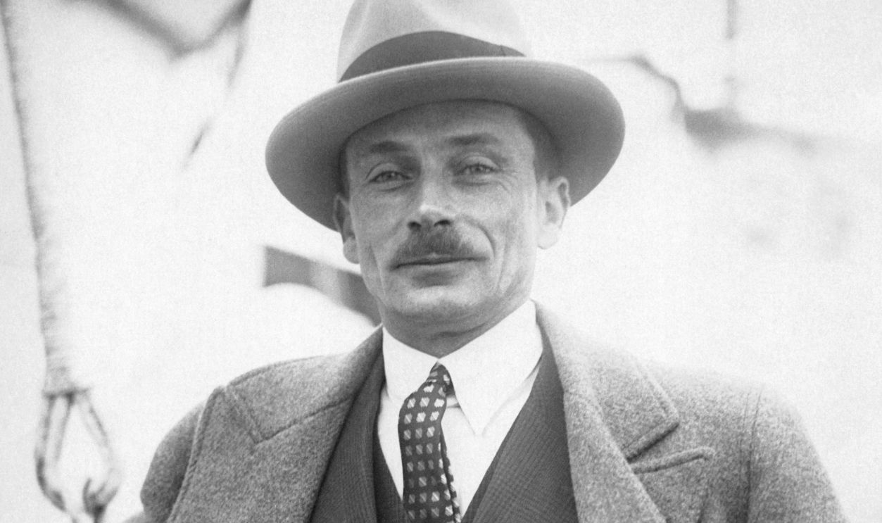 Portrait of fashion designer Lucien Lelong aboard the ocean liner 'SS Paris'.