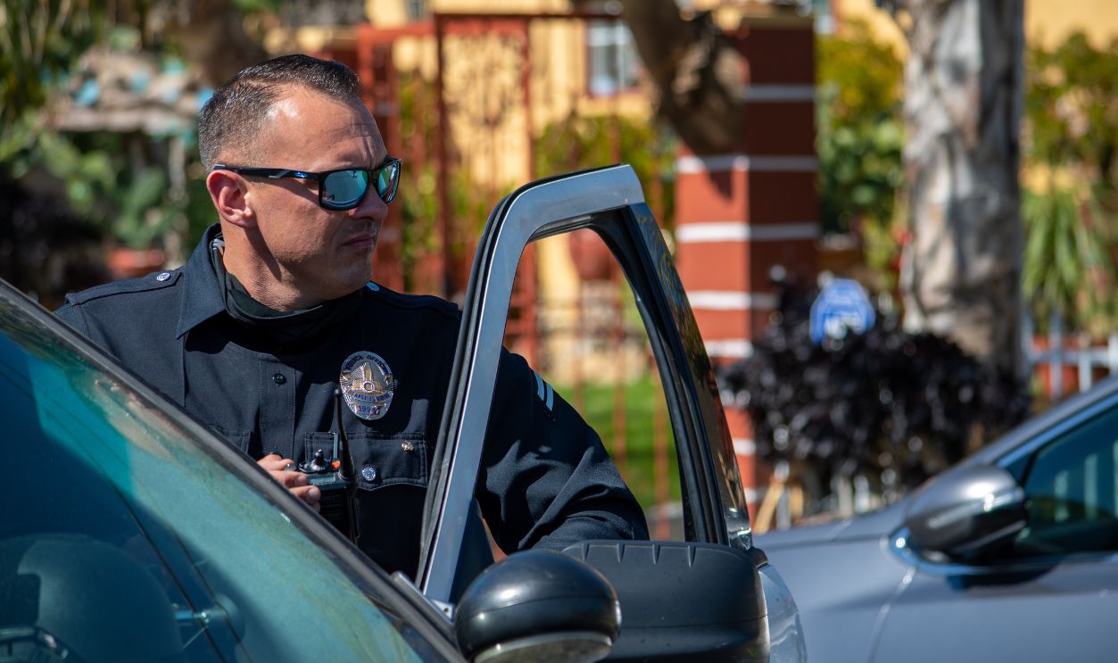 Reseda, California, United States - February 24, 2021: LAPD Swat team, officers, and LAFD Firefighters and helicopters respond to a report of a gunman in a Reseda. One suspect was taken into custody
