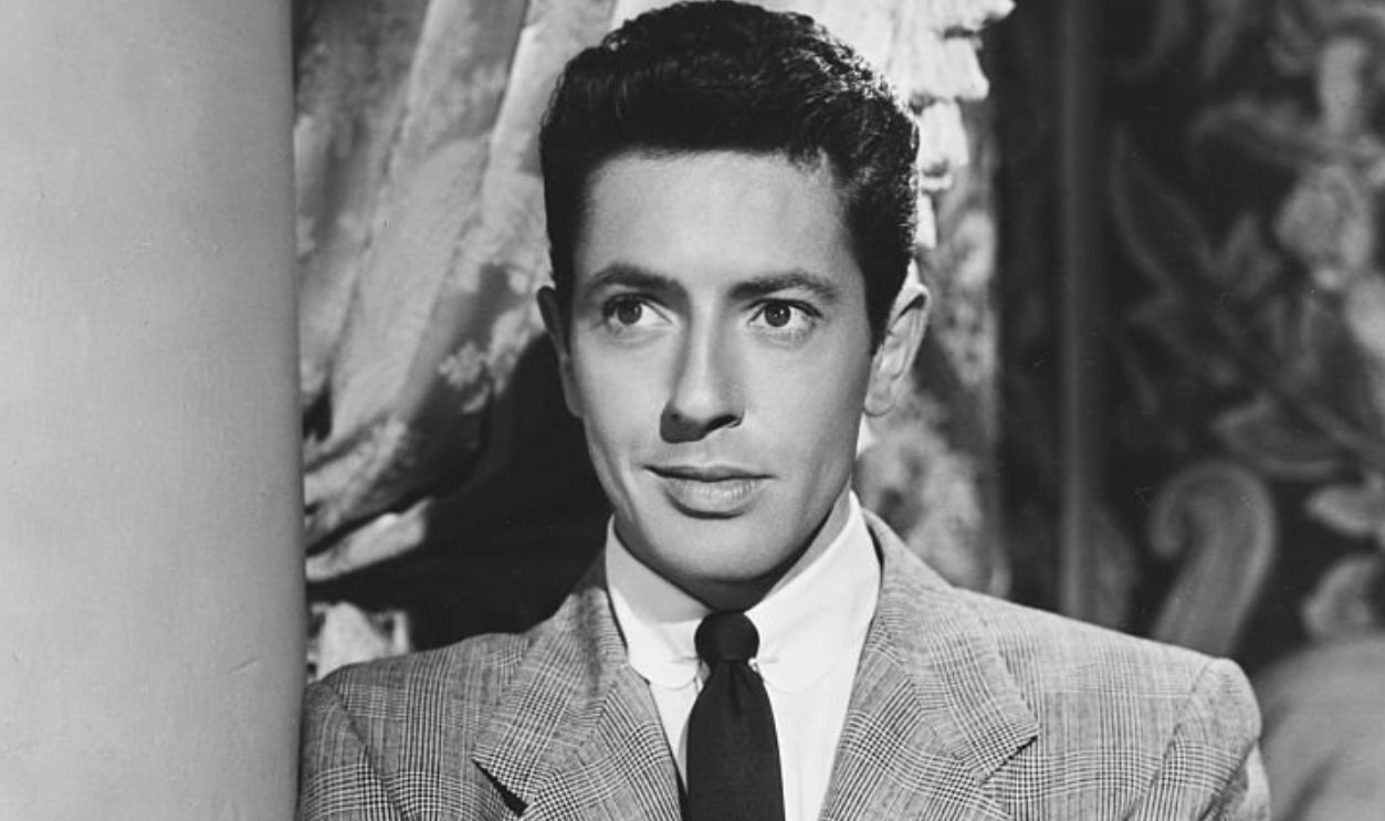 Farley Granger stars as Rick Belrow Livingston in the 1953 romantic musical, Small Town Girl.
