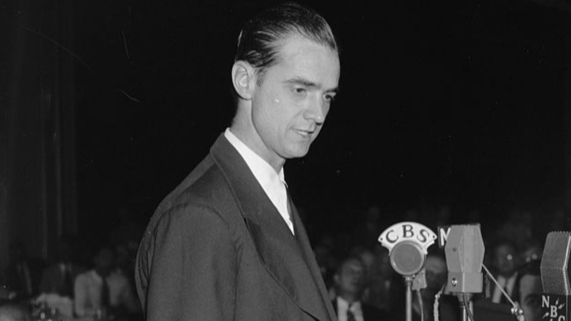Title: Howard Hughes speaking before the Press Club. Washington, D.C., July 21. Howard Hughes, speaking at the National Press Club today, before hundreds of government officials and representatives of foreign governments. Hughes today envisioned a future 