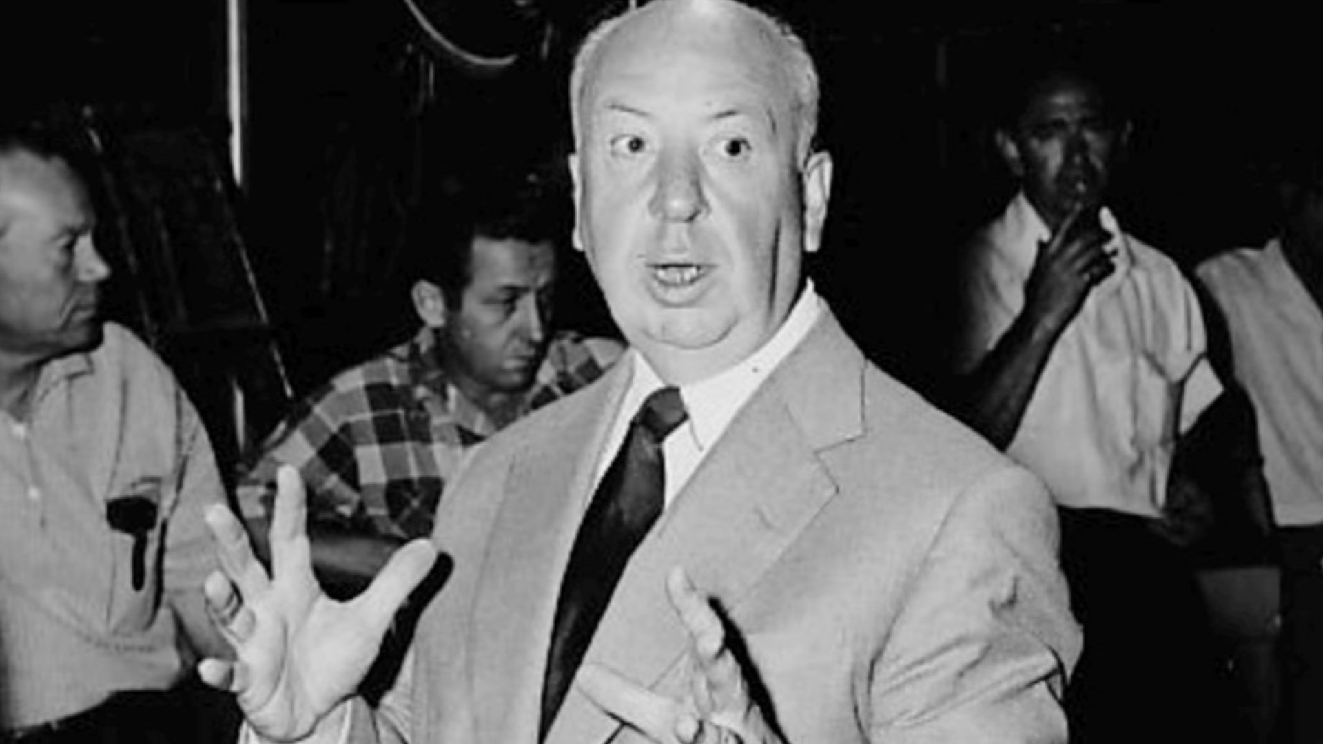 Photo of Alfred Hitchcock on the set of his new television program, Alfred Hitchcock Presents.