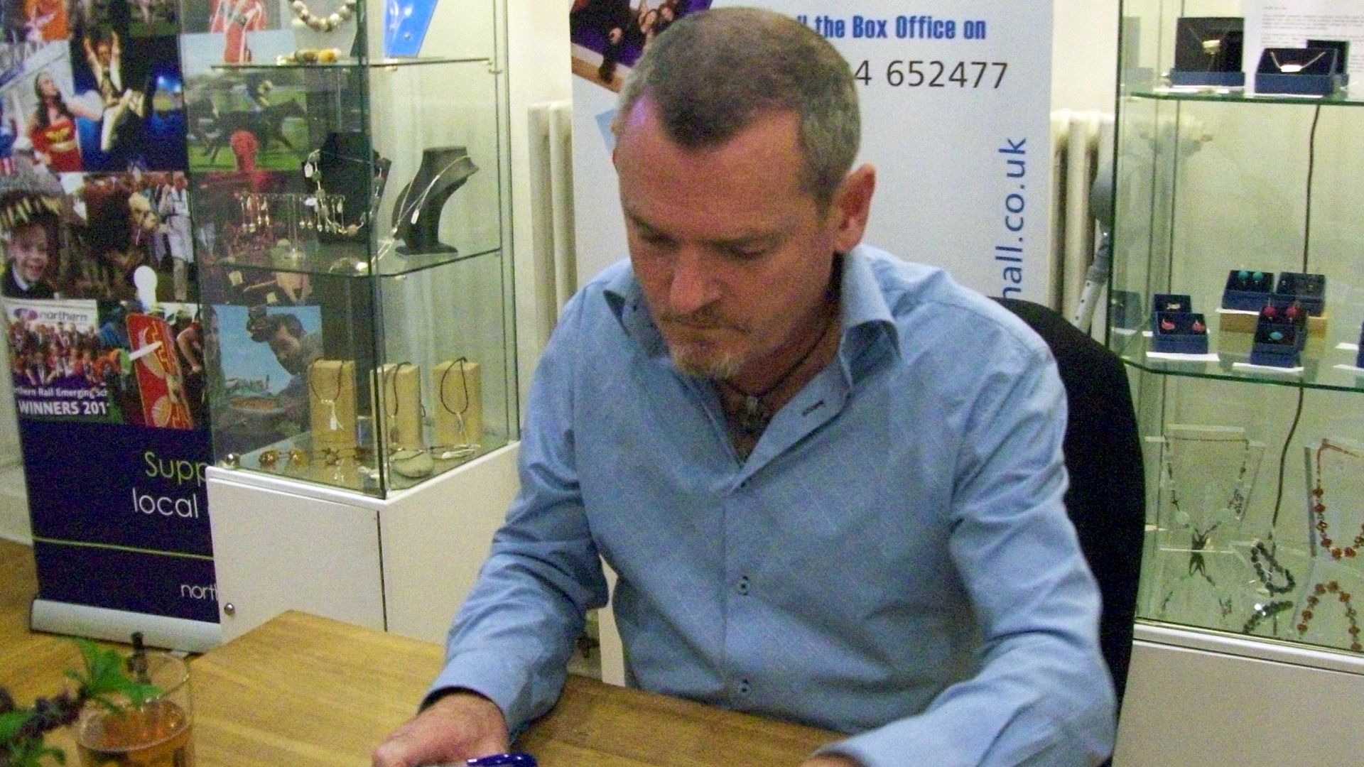 Here is Joe Simpson signing my copy of Touching The Void, unquestionably the best  written, most gripping, tale of survival against cruel pain and long, long odds. I now have four of Joe's books but Touching The Void is my only signed copy.  Sadly althoug