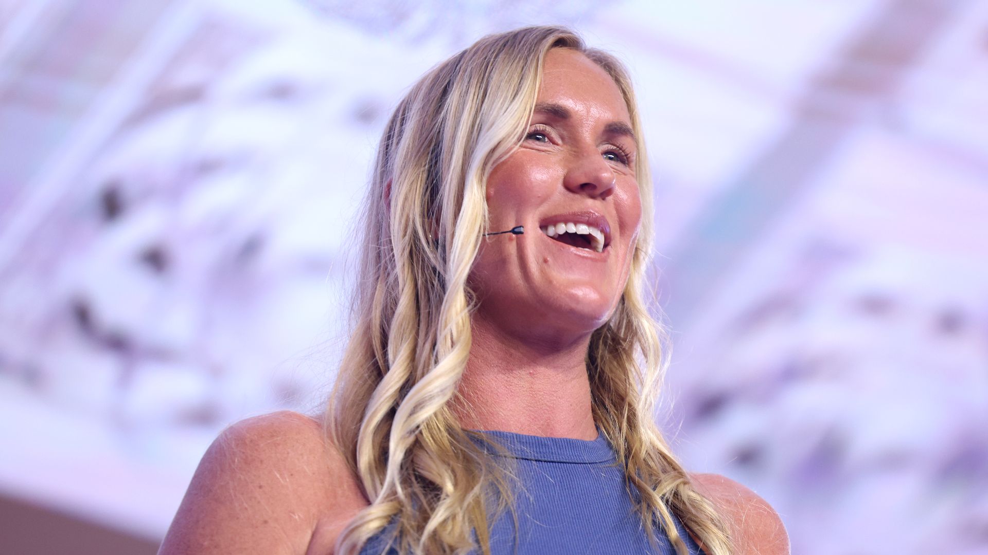 Bethany Hamilton speaking with attendees at the 2025 Young Women's Leadership Summit at the Gaylord Texan Resort & Convention Center in Grapevine, Texas.