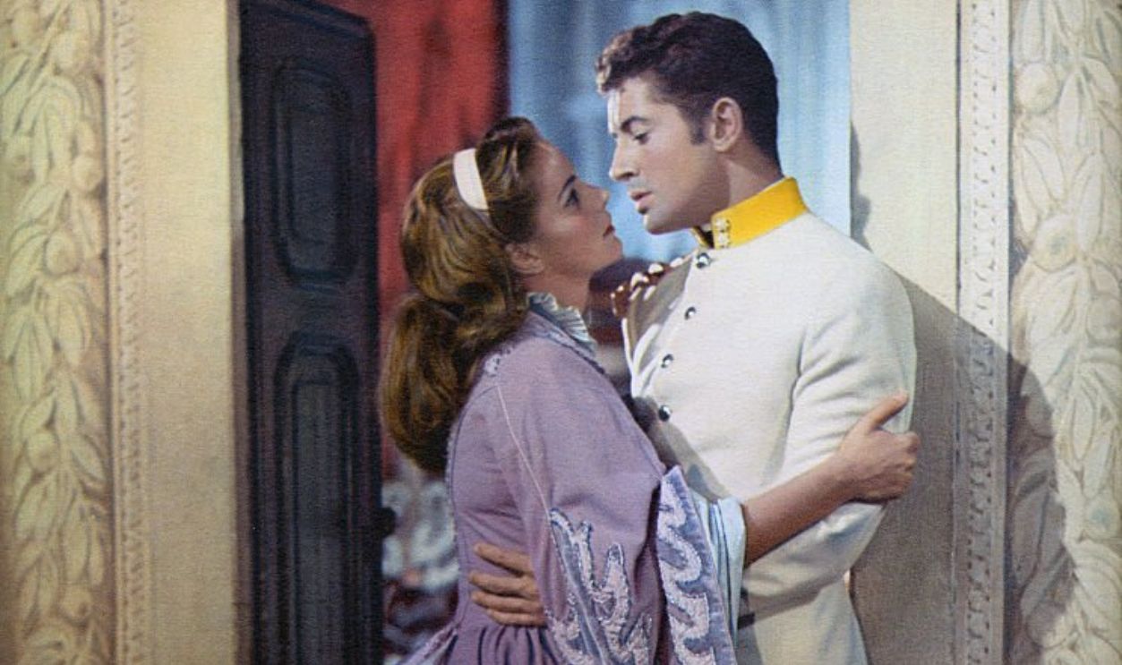 Italian actress Alida Valli and American actor Farley Granger on the set of Senso, written and directed by Luchino Visconti.