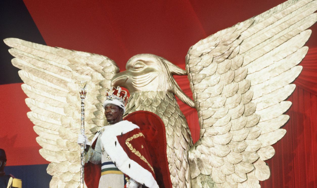 Self-proclaimed emperor of Centrafrican empire, Jean-Bedel Bokassa stands 04 December 1977 on his throne after crowning himself in Bangui, following Napoleon's example