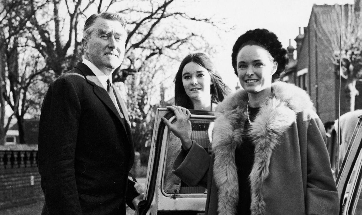 British pirate radio broadcaster Paddy Roy Bates with his wife Joan and daughter Penny during legal action, which took his station, Radio Essex, a.k.a. BBMS (Britain's Better Music Station), off the air. 1st December 1966. The following year, Bates moved to an abandoned World War II anti Aircraft platform in the Thames Estuary, but outside British Territorial Waters. He then proclaimed the territory the Principality of Sealand, its sovereigns being himself (Prince Roy), and his wife (Princess Joan).