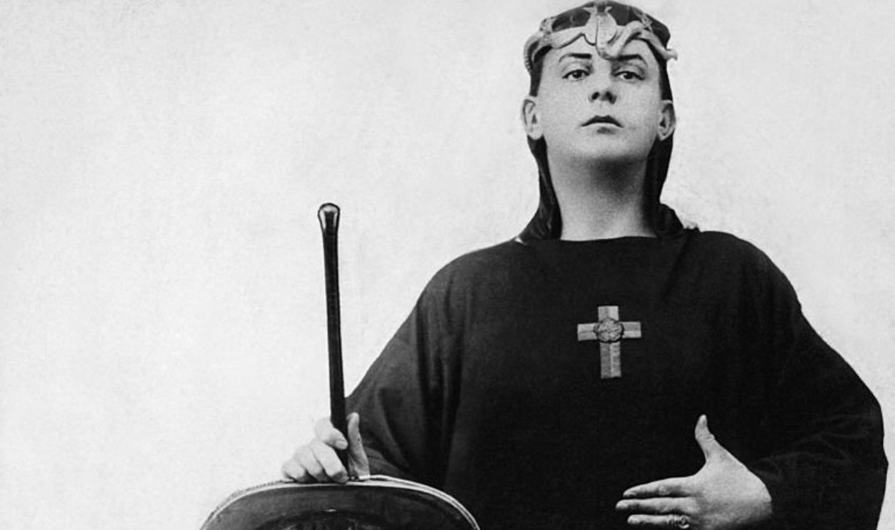 A portrait of occultist Aleister Crowley in ceremonial clothing, England, 1912. 