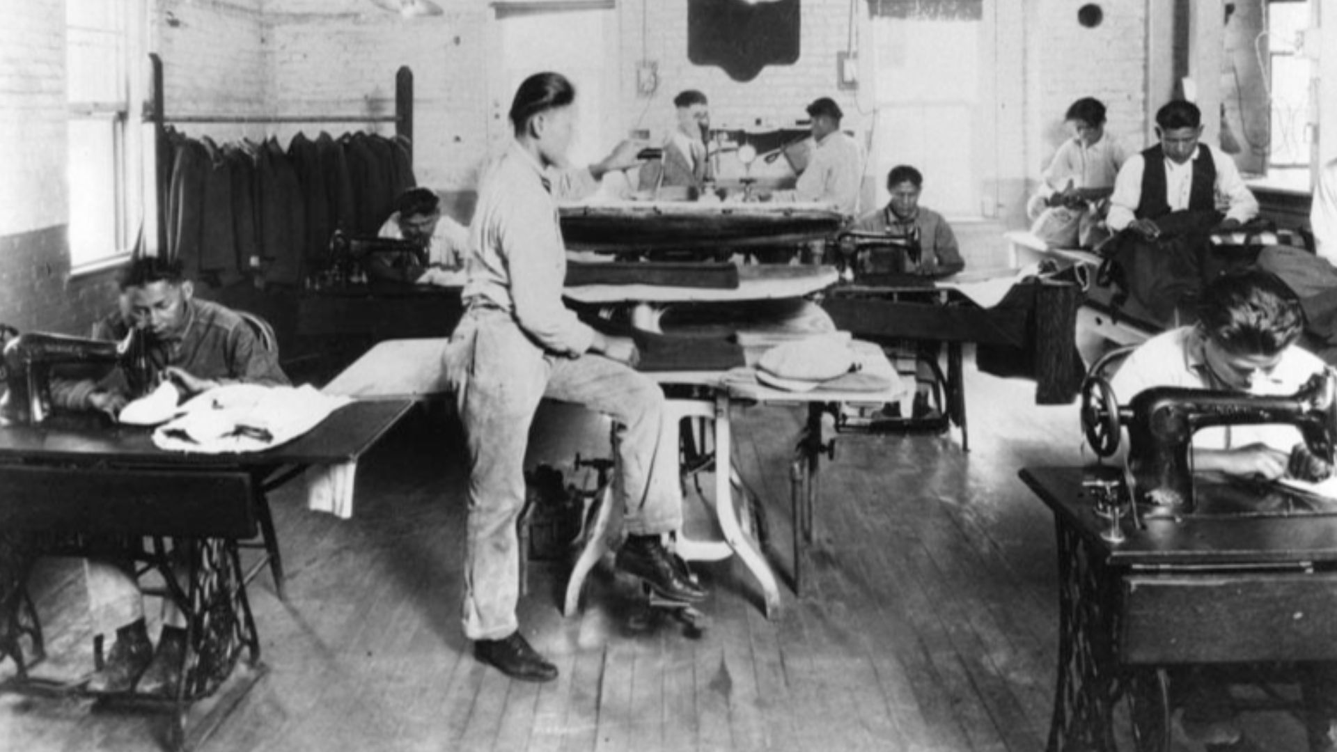 American Indian students at work in the tailor shop at Sherman Institute (known later as Sherman Indian High School), circa 1920.
