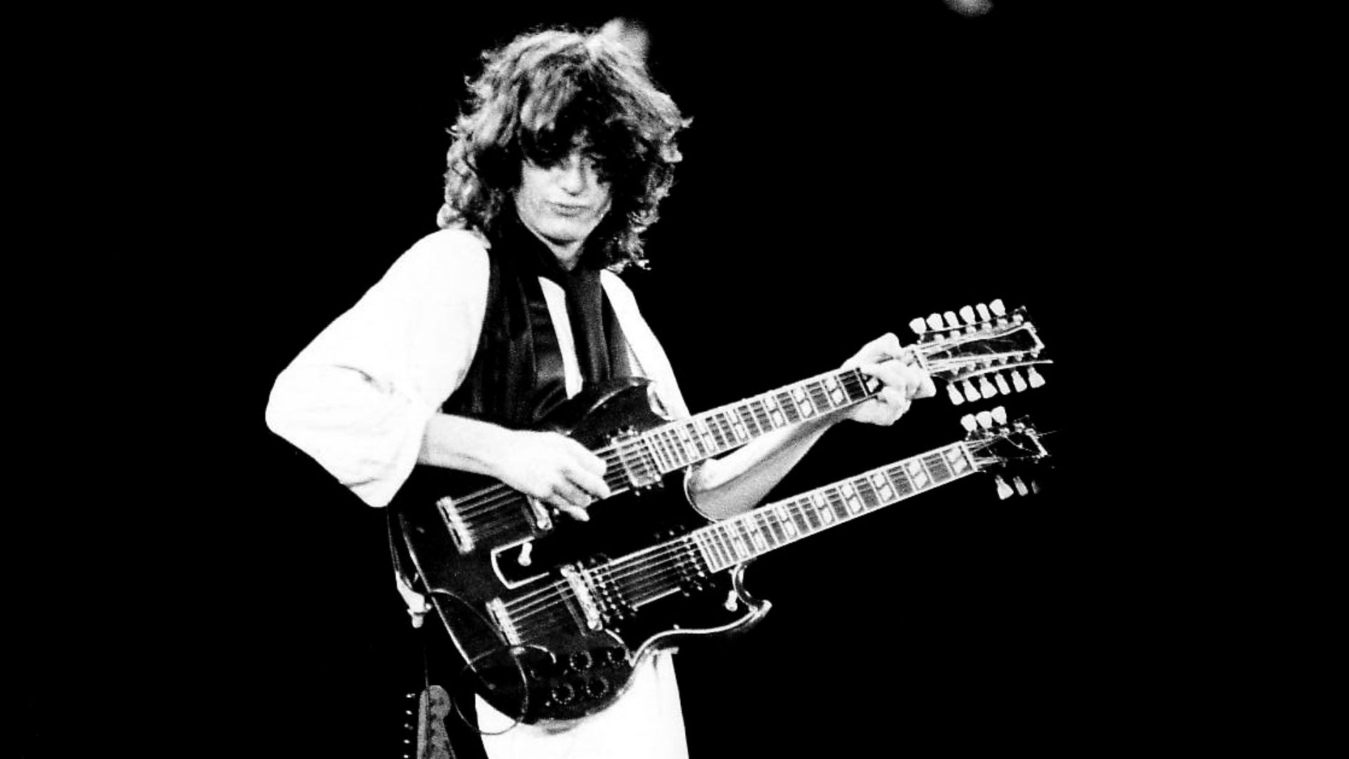 Jimmy Page at the A.R.M.S. benefit at The Cow Palace, San Francisco, Ca., in 1983.